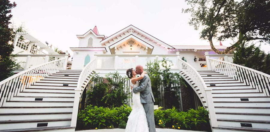 Couple Kissing in front of Tybee Wedding Chapel